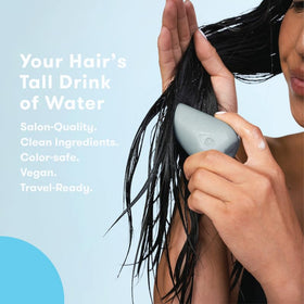 HiBAR conditioner applied to wet hair demonstrating smooth, hydrating application