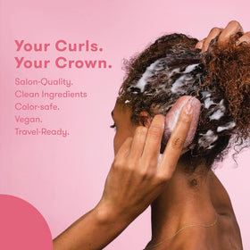 HiBAR bars in hands on wet hair demonstrating easy application