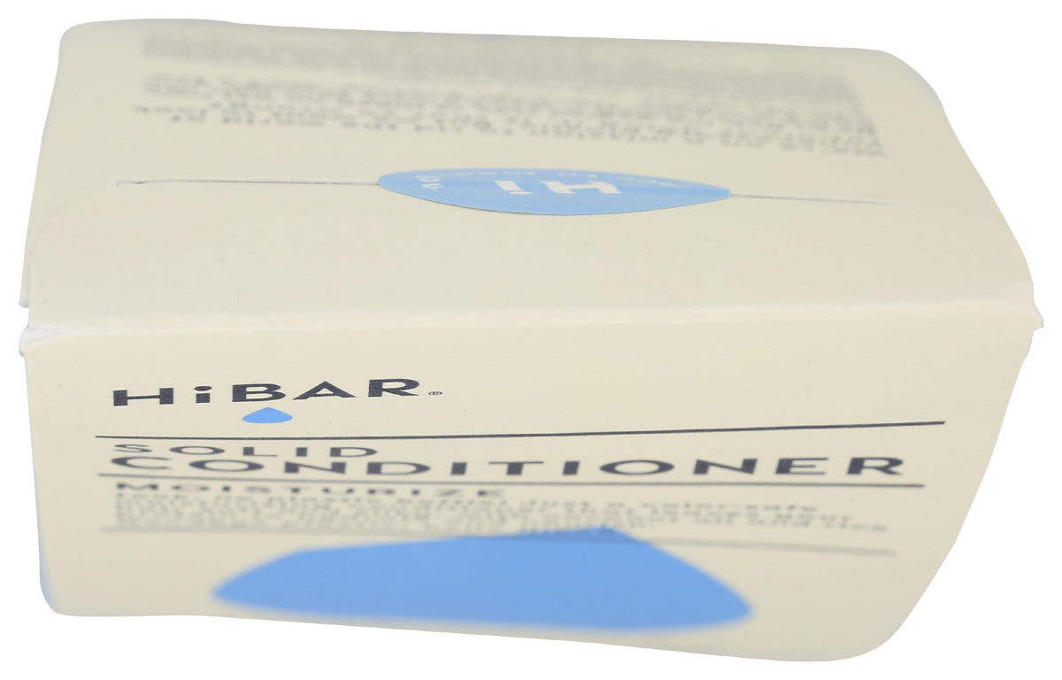 HiBAR conditioner bar in hand demonstrating easy application and control