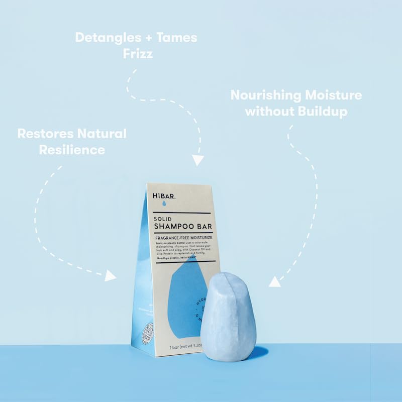 HIBAR shampoo bar in hand showing compact travel-friendly size