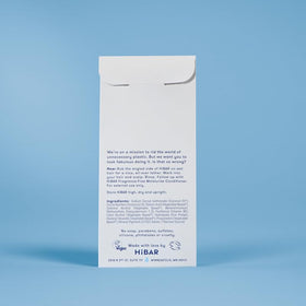 HIBAR shampoo bar plastic-free packaging detail promoting eco benefit