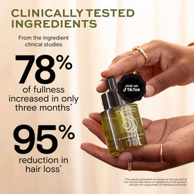 Highbrow Hippie applying serum to scalp to show targeted root support