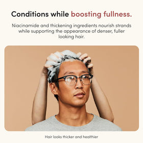 HIMS & HERS conditioner texture on hand, showing lightweight moisturizing feel