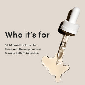 HIMS & HERS hims clear solution on hand highlighting non-greasy texture