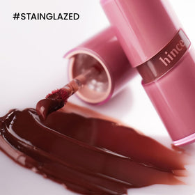 hince product on model demonstrating dewy, natural glass glow benefit in everyday wear