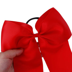 Hipcheer elastic ponyholder detail showing wrapped tie that protects hair and secures bow