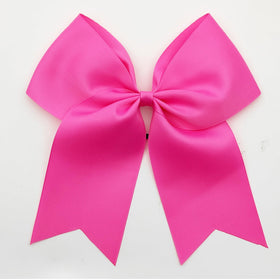 Hipcheer bow worn at cheer practice showing coordinated team spirit benefit