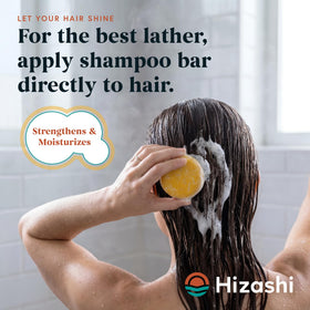 Hizashi shampoo bar lather in hand demonstrating gentle cleansers and foam