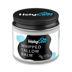 HolyCow lifestyle baby care staging showing gentle balm used for infant skin comfort