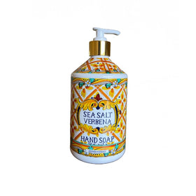 Home & Body Company lathering Villa Flora soap foam in hand showing gentle cleansing action