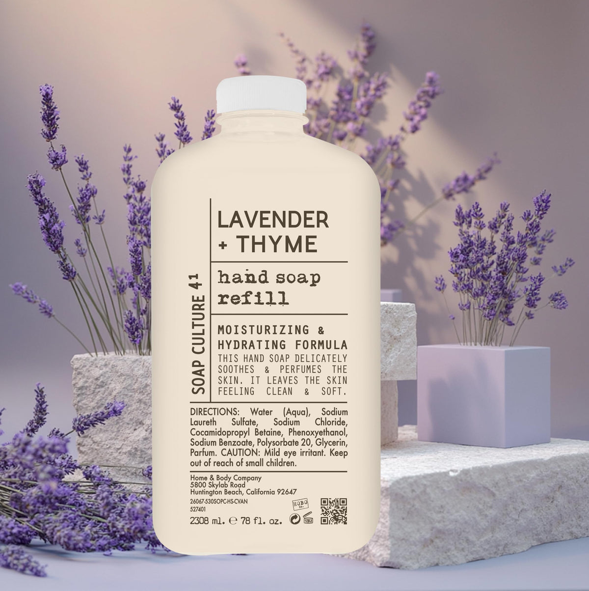 Home & Body Company liquid soap being dispensed into a bathroom sink for gentle cleansing
