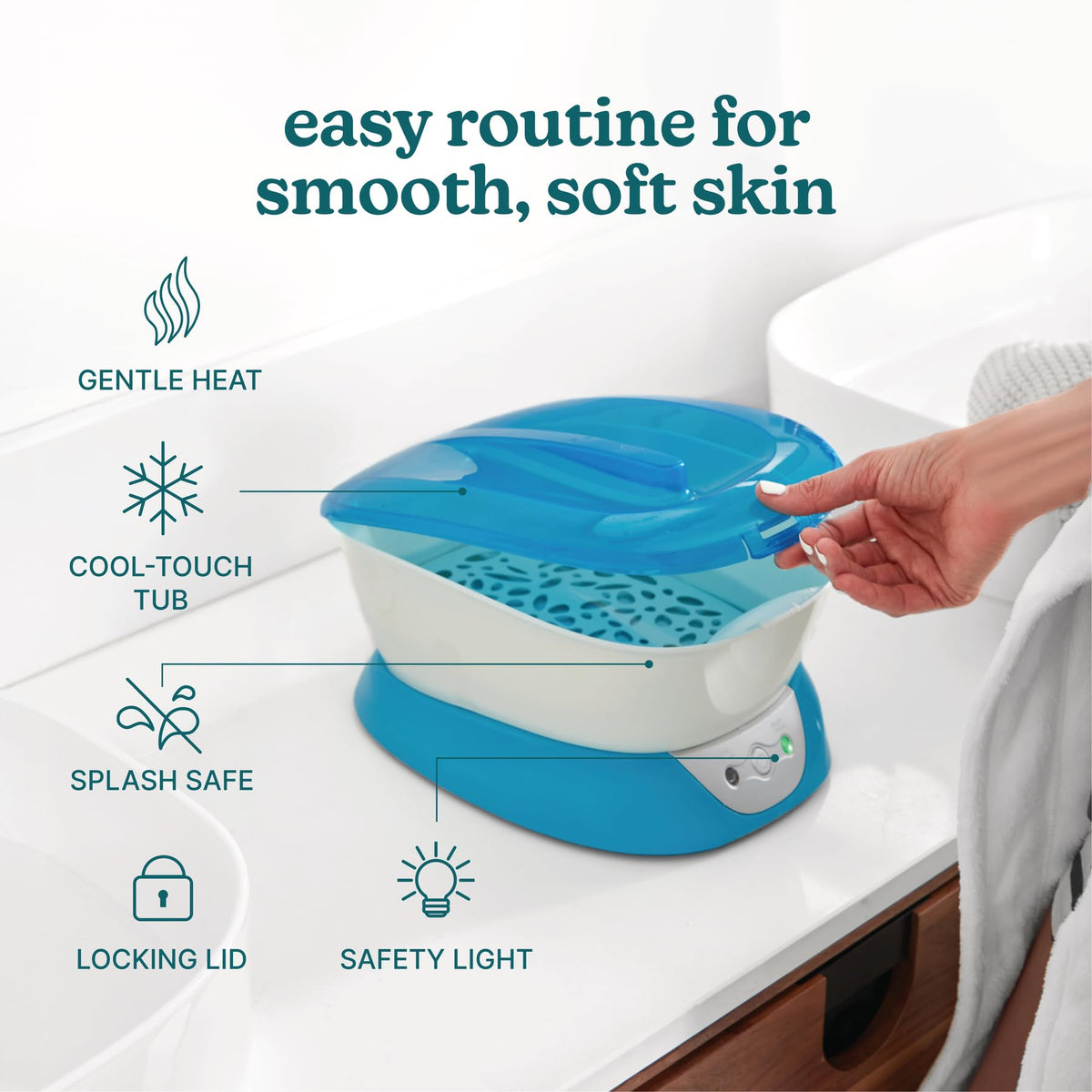 Homedics paraffin machine with hand being dipped, demonstrating comforting warm treatment