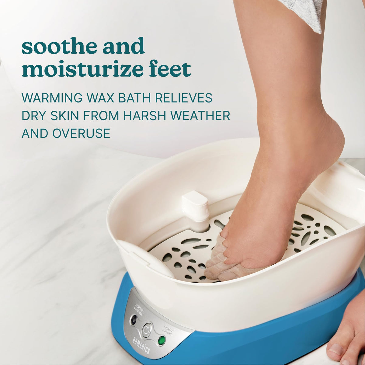 Homedics bath next to a hand for scale to show compact footprint suitable for countertops