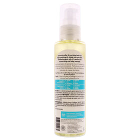 The Honest Company oil poured onto palm, showing texture and easy absorption benefit