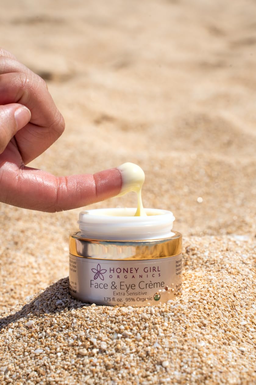Honey Girl Organics applying creme around eye area demonstrating gentle soothing benefit