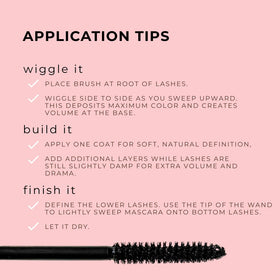 Honeybee Gardens applying mascara in mirror for everyday natural enhancement benefit