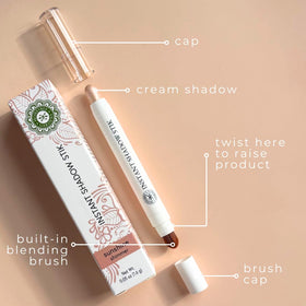 Honeybee Gardens Instant Shadow Stik held in hand to show size and travel-ready convenience