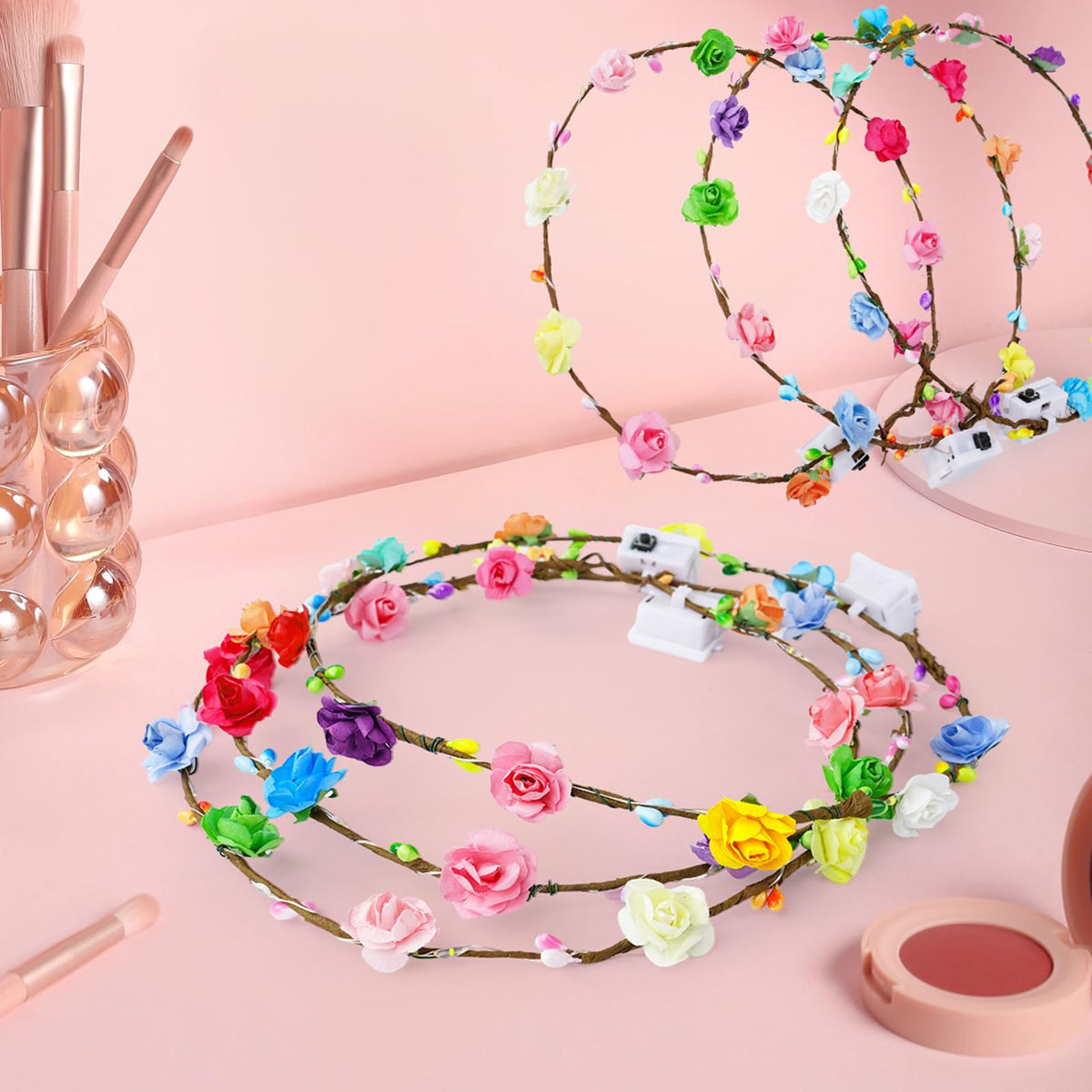 HONLYNE hand holding crown for scale to show compact, easy-to-wear size