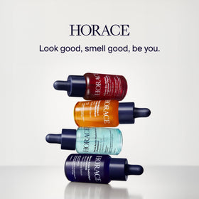 HORACE 30ml bottle next to hand for size comparison and travel-friendly benefit