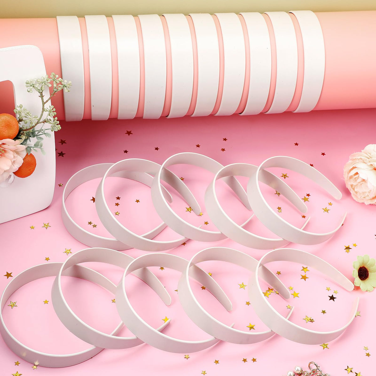 Hotop headbands on a craft table with ribbons and glue showing customization workflow