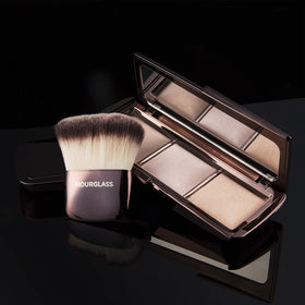 HOURGLASS ambient palette in use on cheek showing luminous blend and natural-looking glow