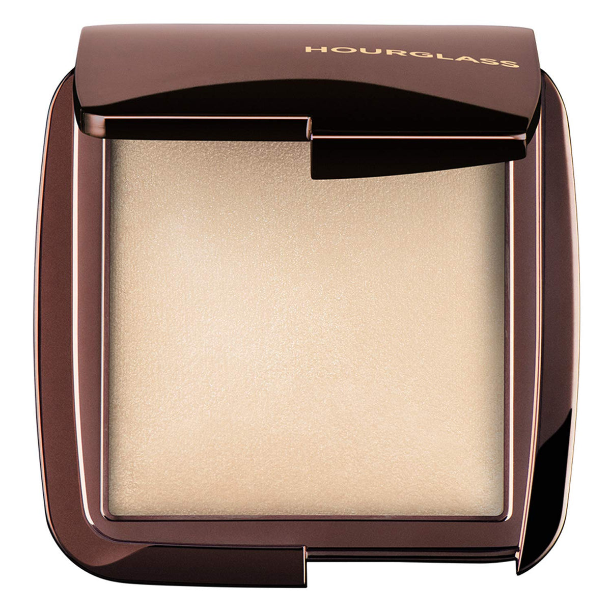 Hourglass compact front view showing powder pan with soft diffused finish benefit