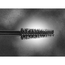 Hourglass mascara swiped on lashes highlighting length and defined volume