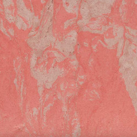 HOURGLASS powder texture close-up revealing micro-fine pigments for a diffused glow