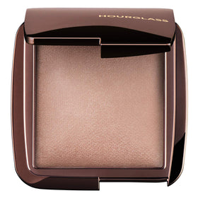 HOURGLASS compact front view showing Dim Light powder and elegant packaging benefit: travel-ready finish