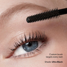 Hourglass mascara held in hand to show size and easy everyday carry