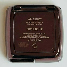HOURGLASS close-up of finely milled powder texture showing soft blurring benefit