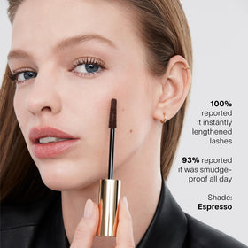 Hourglass travel-size next to credit card illustrating compact convenience