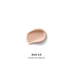 Hourglass Vanish applicator detail highlighting doe-foot tip for precise, mess-free application