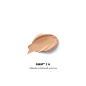 HOURGLASS applicator wand dispensing concealer for precise, mess-free application