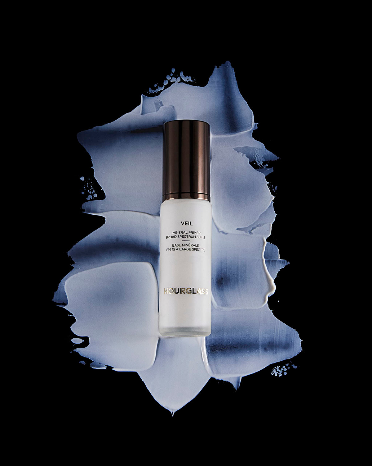 HOURGLASS Veil Mineral Primer applied to cheek demonstrating smoother pores and longer-lasting makeup