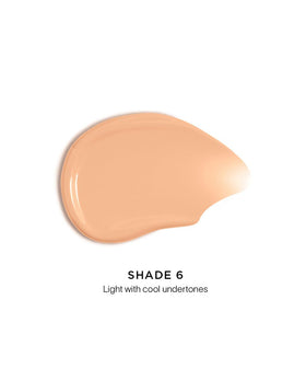 HOURGLASS texture close-up displaying dewy, lightweight consistency for easy blending