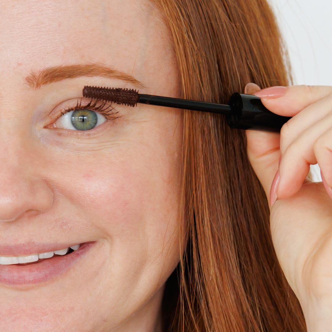 How to Be A Redhead mascara size next to coin showing compact travel-friendly design benefit