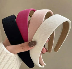 Huachi front view of three headbands showing color options and neat finish benefit