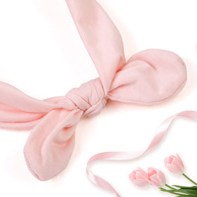 Huachi headband worn during running showing secure, sweat-friendly fit