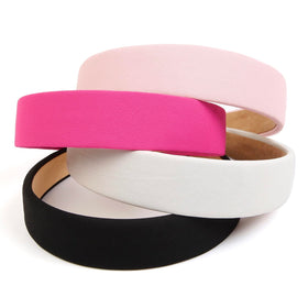 Huachi headband worn with ponytail outdoors demonstrating secure hold during activity