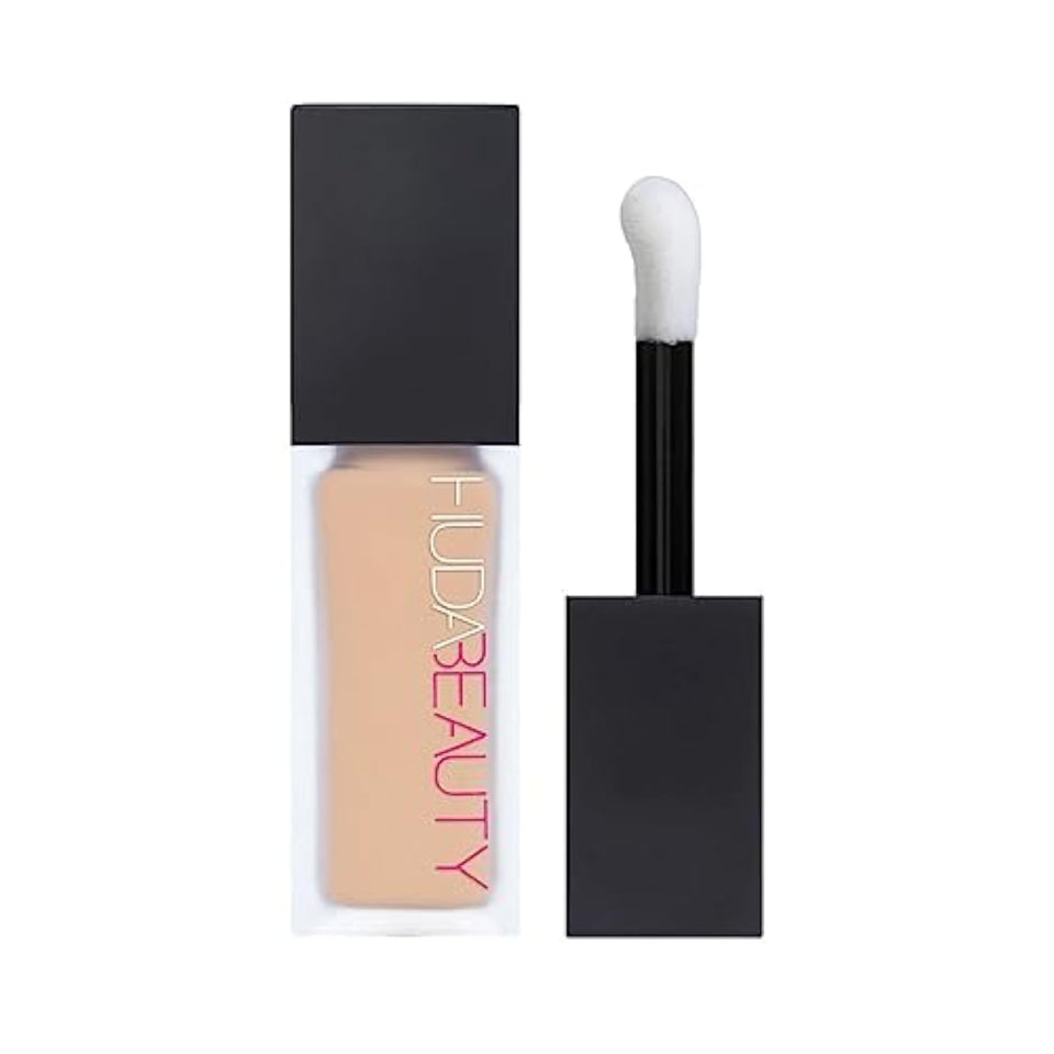 Huda Beauty front tube Coconut Flakes displays shade and easy-to-apply wand for natural coverage