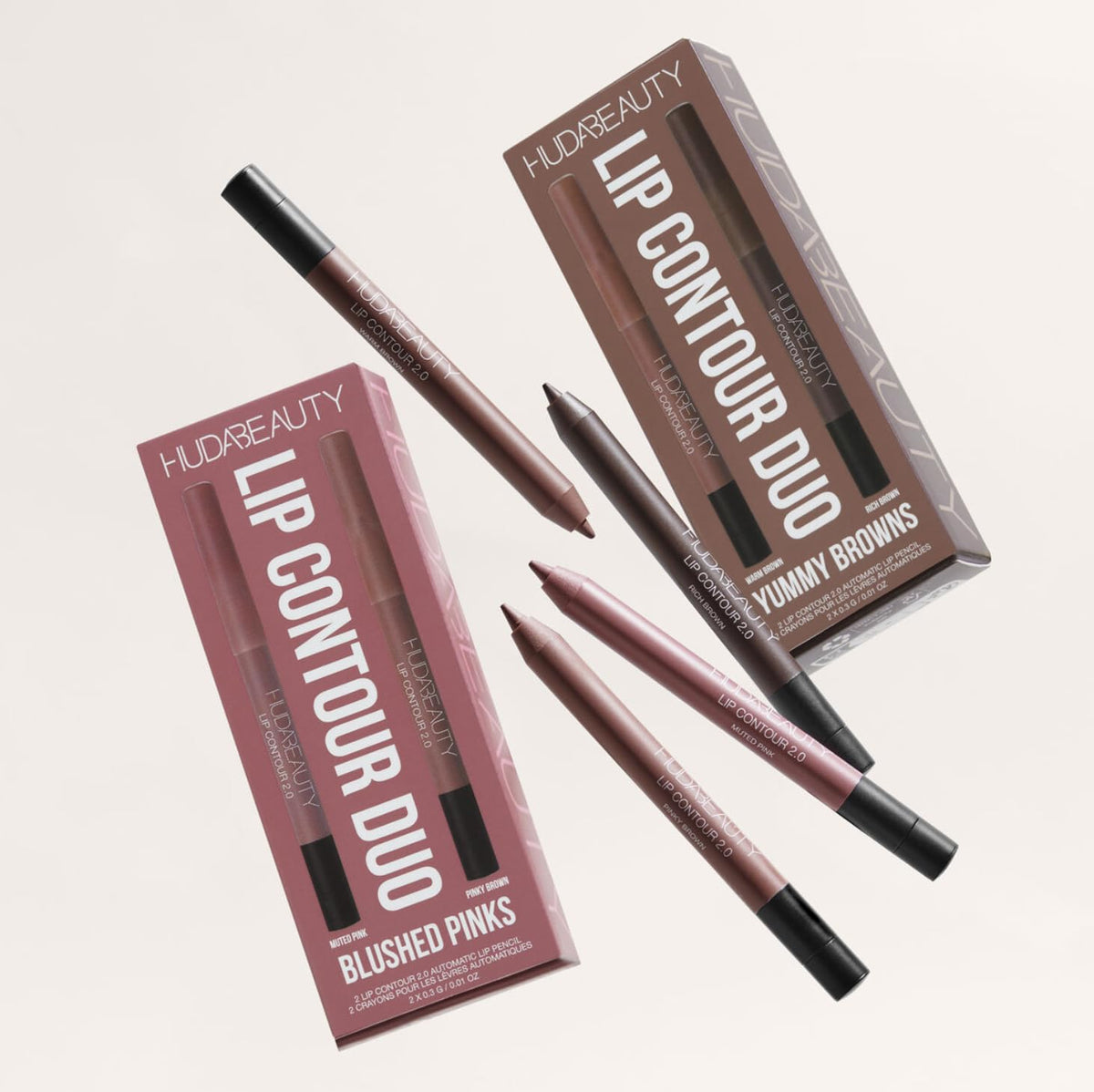 Huda on-model application illustrating defined lips and natural volume