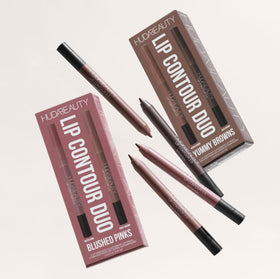 Huda on-model application illustrating defined lips and natural volume