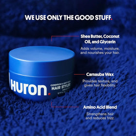 Huron styling cream being applied to damp hair for easy styling