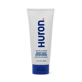 Huron front packaging of face moisturizer showing sleek bottle and brand benefit