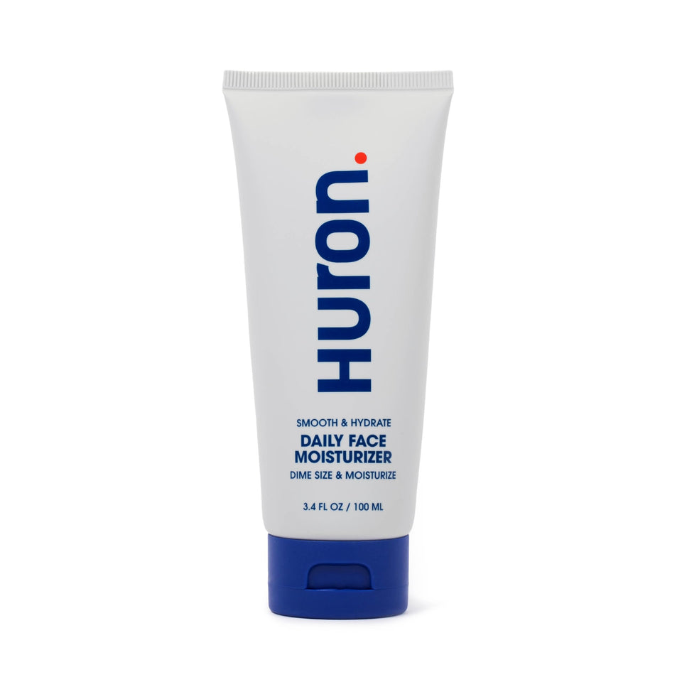 Huron front packaging of face moisturizer showing sleek bottle and brand benefit