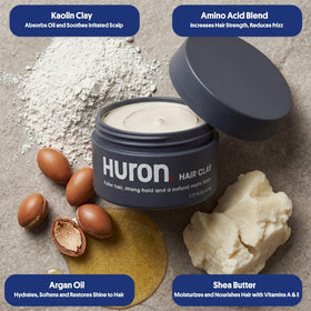 Huron clay on hands being worked in for easy application benefit