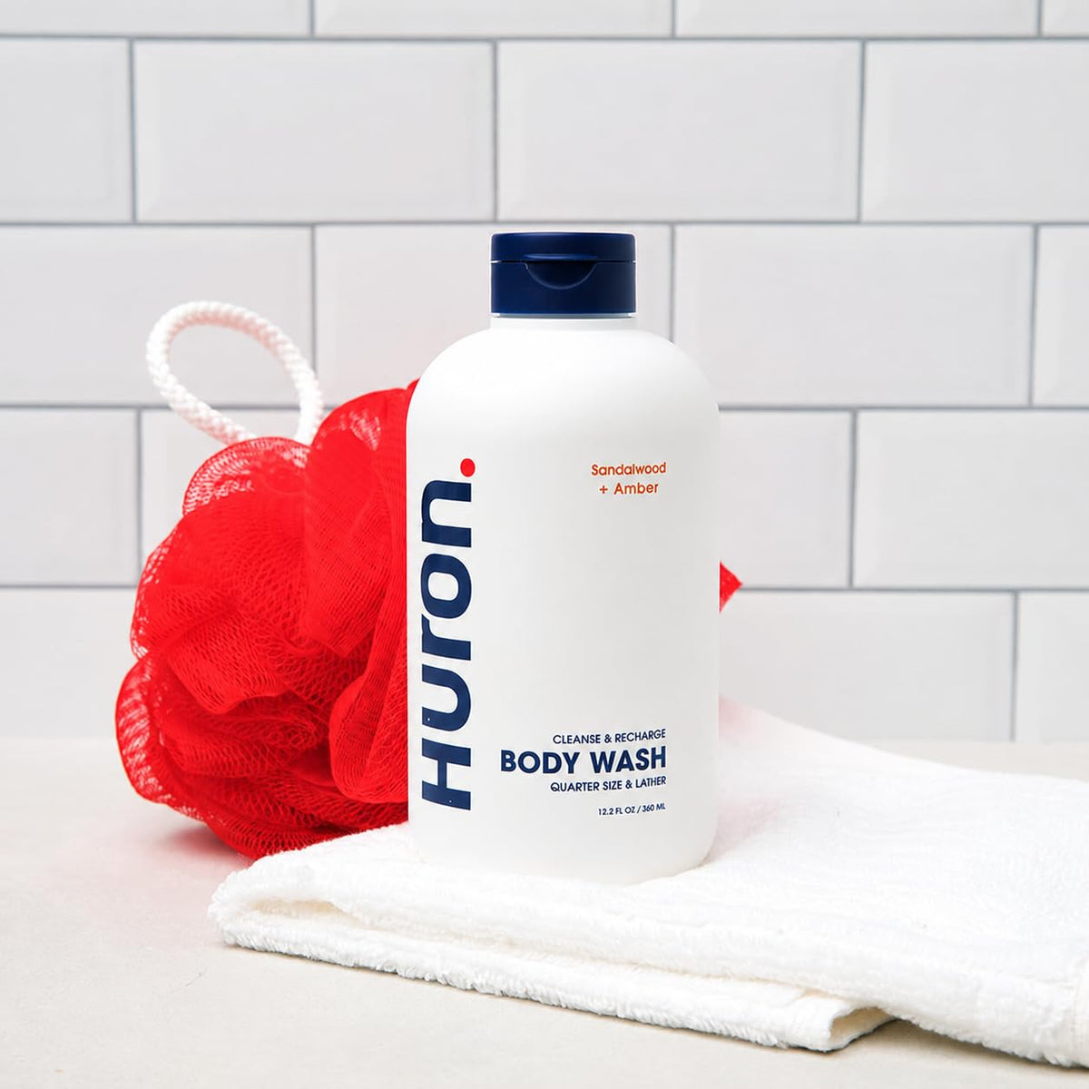 Huron lifestyle bathroom still life suggesting a warm sandalwood scent and calm routine