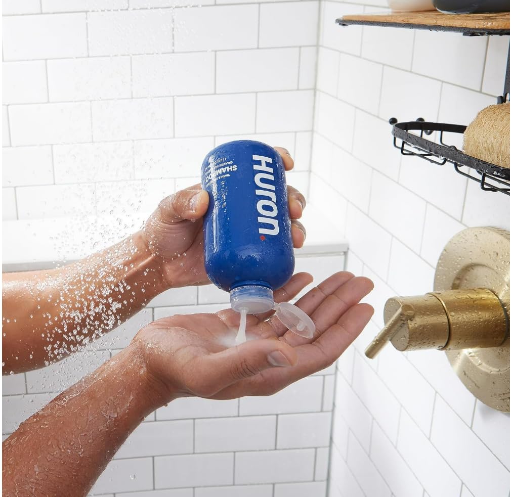 Huron shampoo in shower setting showing fresh scent and routine fit