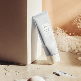Huxley creamy foam texture close-up demonstrating dense lather and gentle cleansing
